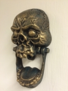 Large skull as a door knocker, brass, very nice!