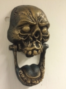 Large skull as a door knocker, brass, very nice!