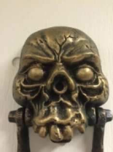 Large skull as a door knocker, brass, very nice!