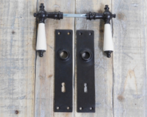 Set of door hardware - antique iron dark brown - with porcelain handles - for room doors