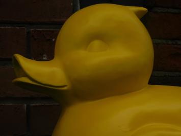 Sizeable duck as piggy bank - bright yellow - polystone