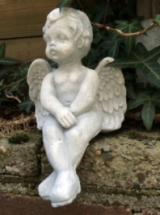 Small sitting Angel made of solid stone, beautiful to see!!