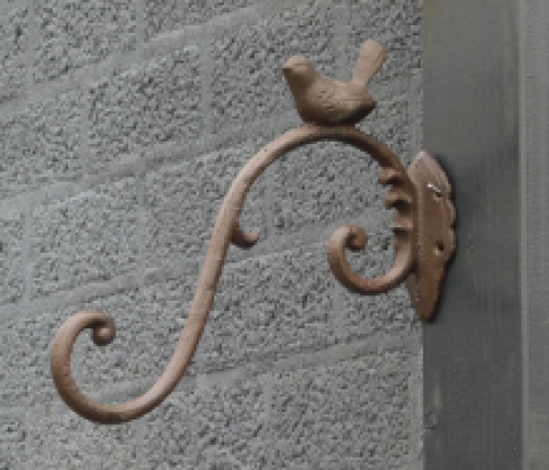 Cast iron hook with bird, brown, very beautiful to behold