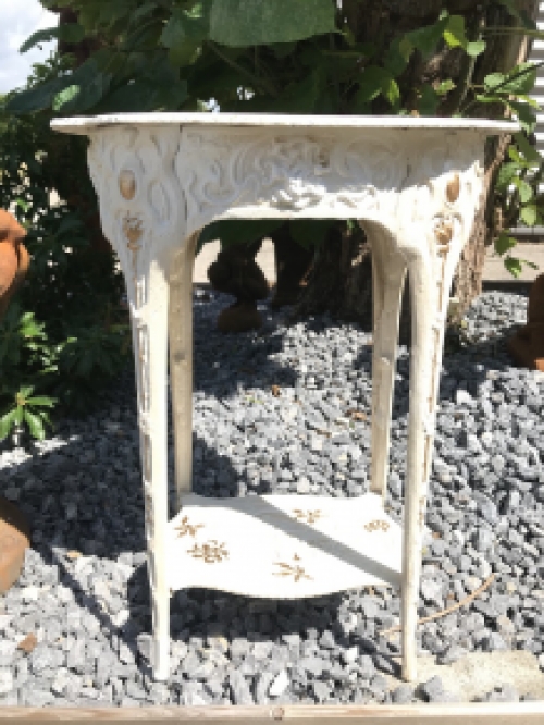 A cast iron table, white, art nouveau ''flower''