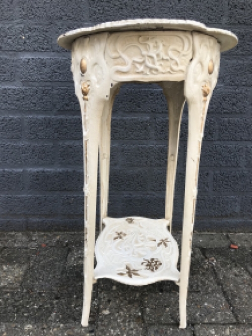 A cast iron table, white, art nouveau ''flower''