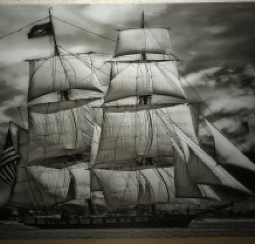 Art on glass showing a beautiful sailing ship