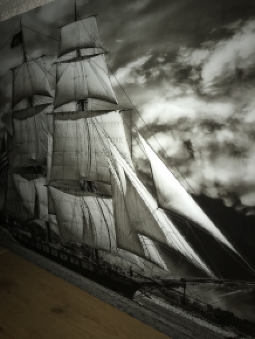 Art on glass showing a beautiful sailing ship