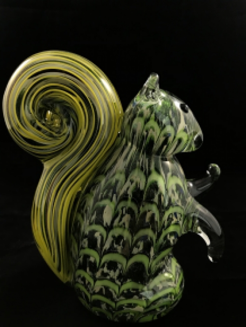 A beautiful glass statue of a squirrel, a glass work of art!