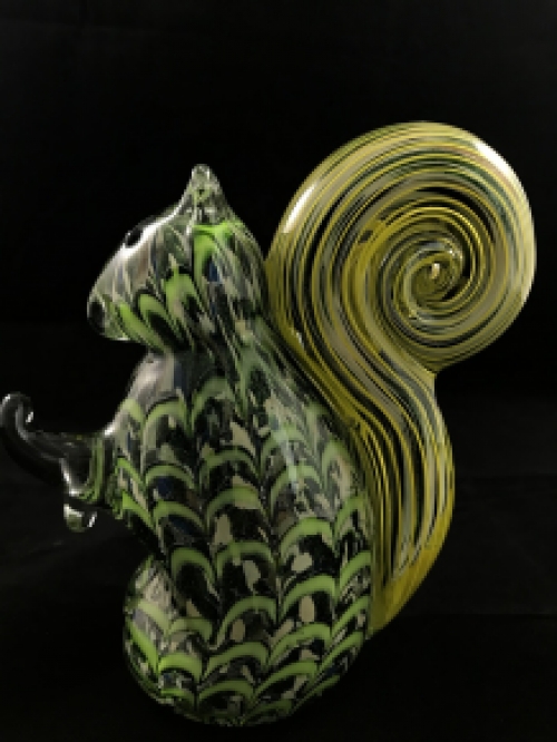 A beautiful glass statue of a squirrel, a glass work of art!