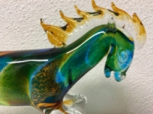 Glass blown horse, full of color, beautiful design.