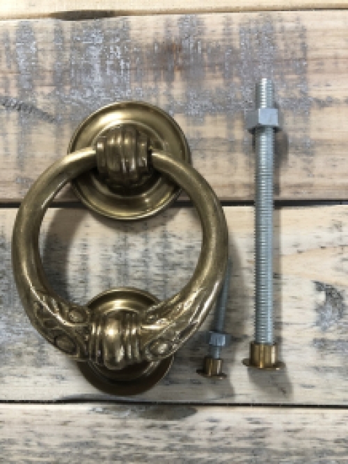 Door knocker, stylish and antique brass.