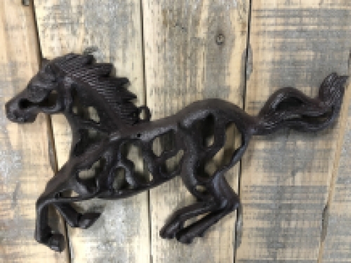 Wall ornament abstract image of a running horse, cast iron brown.