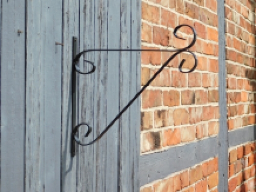 Decorative wall hook with curl - hanging basket hook