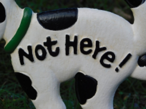 Dog sign 'Not Here - garden stick, cast iron