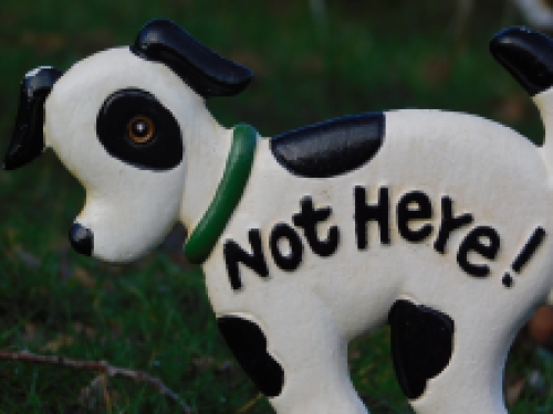 Dog sign 'Not Here - garden stick, cast iron