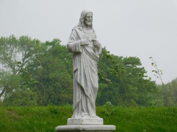 Sacred Heart statue on pedestal - solid stone