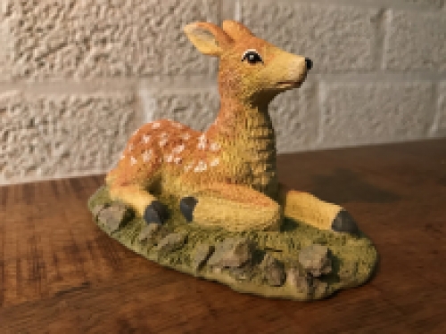 Reclining deer, nice statue made of polystein