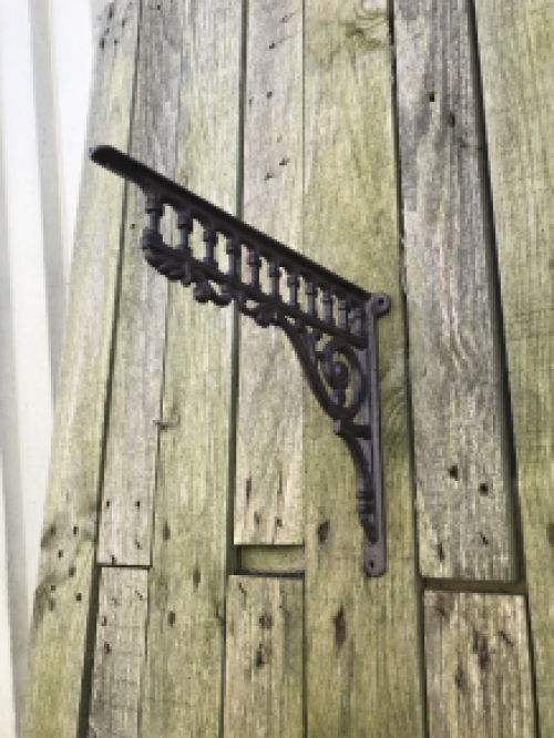 Set of antique sleek shelf supports, cast iron.