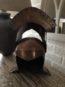 Knight's helmet copper, with folding visor.