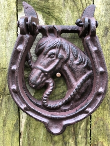 Beautiful door knocker,horse with horseshoe, cast iron.