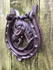 Beautiful door knocker,horse with horseshoe, cast iron.