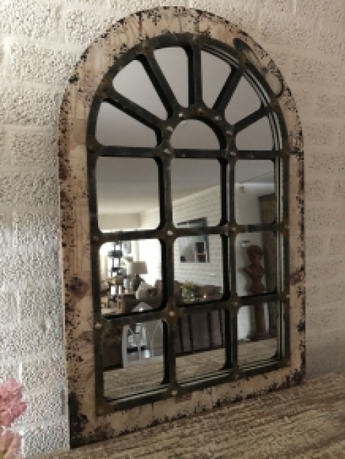 Large substantial stable window mirror, very nice in shape and robust in execution.