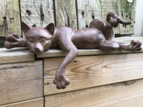 Sculpture lying cat from Polystein