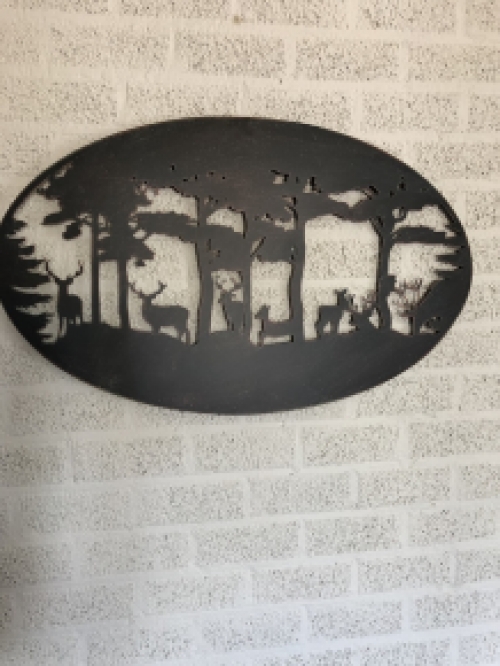 Wall ornament, wall decoration metal oval, deer in the forest.