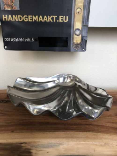 Nickel shell as bowl, top design.