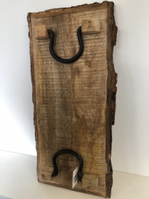 Beautiful rustic cutting board made of solid wood, nostalgic kitchen board, with metal brackets.