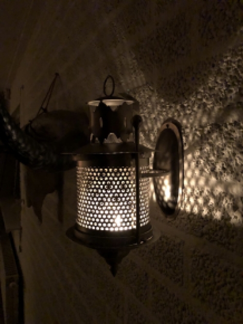 Wall lantern metal gray, perforation part to pass the light on the wall!