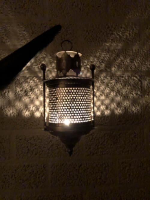 Wall lantern metal gray, perforation part to pass the light on the wall!