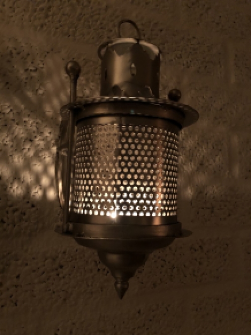 Wall lantern metal gray, perforation part to pass the light on the wall!