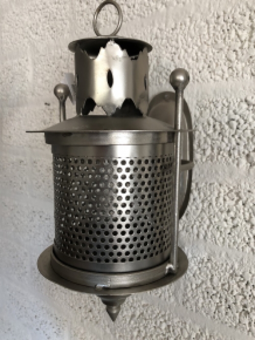 Wall lantern metal gray, perforation part to pass the light on the wall!