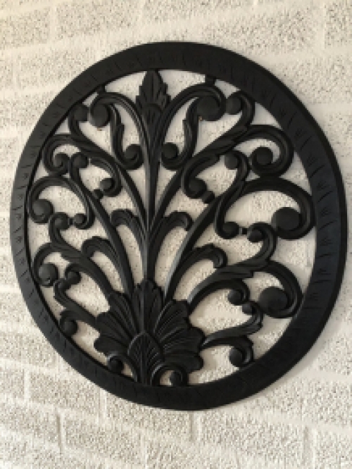 Wall ornament round, decoratively carved, black-brown, small