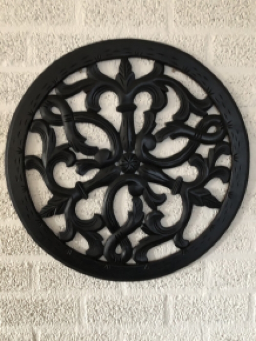 Wall ornament round, beautifully carved, black-brown, small