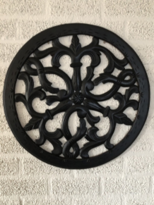 Wall ornament round, beautifully carved, black-brown, small