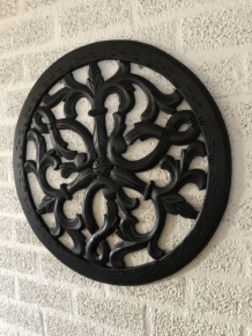 Wall ornament round, beautifully carved, black-brown, small