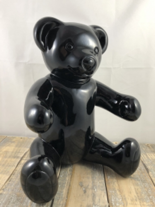 Beautiful black sitting polystone bear.