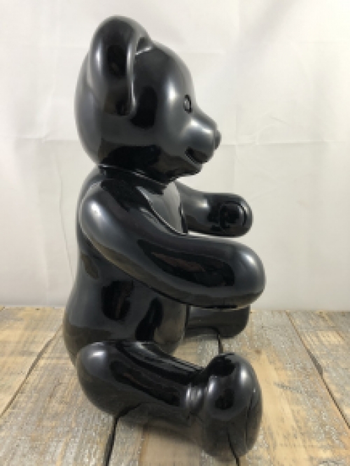 Beautiful black sitting polystone bear.