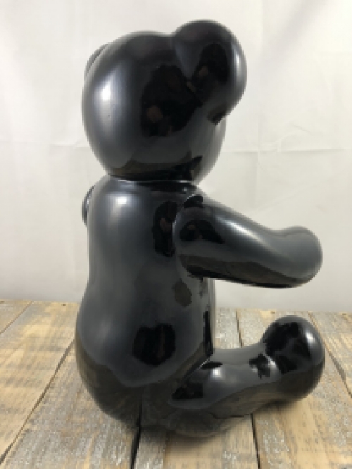 Beautiful black sitting polystone bear.