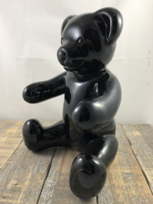 Beautiful black sitting polystone bear.