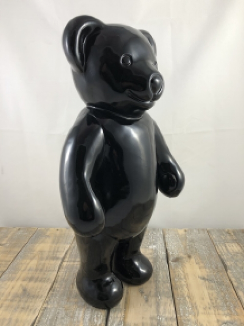 Beautiful black standing polystone bear.