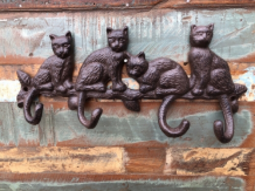 Coat rack with 4 cats and the hooks are the tails, great!