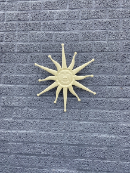 Wall ornament old-white sun, metal.