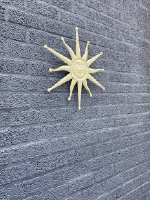 Wall ornament old-white sun, metal.