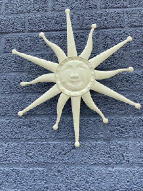 Wall ornament old-white sun, metal.