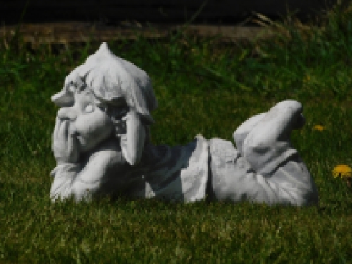 Statue dwarf lying - solid stone