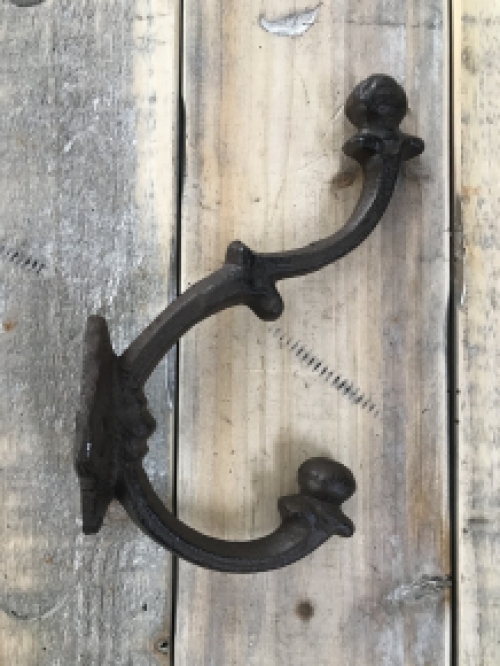 Clothes hook for the wall, brown iron