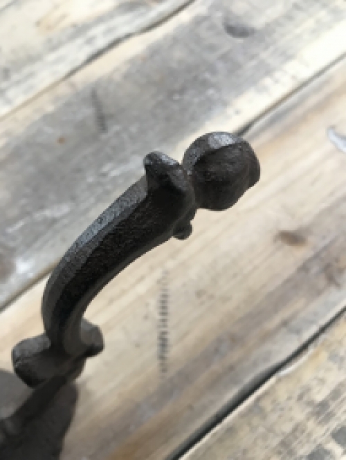Clothes hook for the wall, brown iron